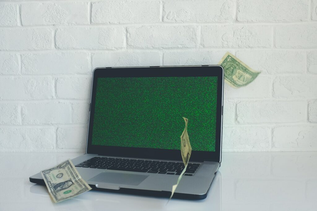 dollar bills & laptop